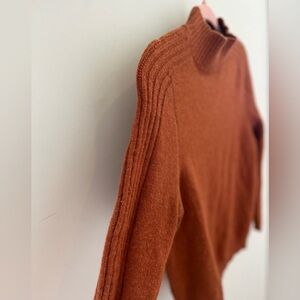 Women’s mockneck sweater. Rust color. Size medium.